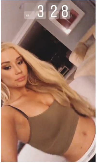 Iggy Azalea belly and cleavage exposed